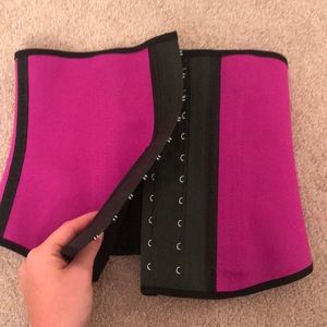 Angel Curves Kardashian’s Waist Trainer